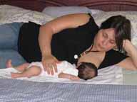 photo of mother breastfeeding her newborn baby