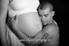 pregnancy photo - dad hugging pregnant belly